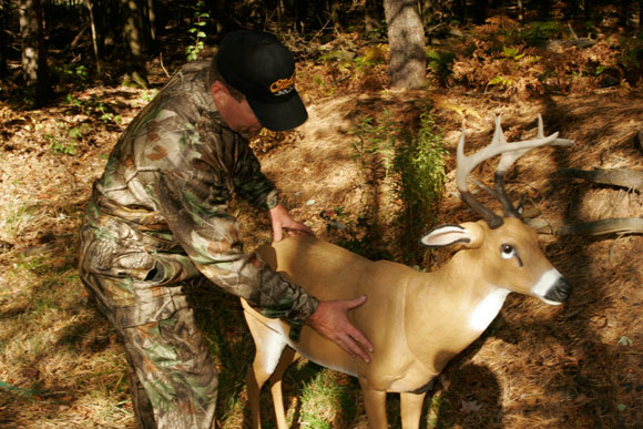Hunter with deer decoy