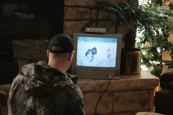 Bow hunter watching video Bow hunter watching video