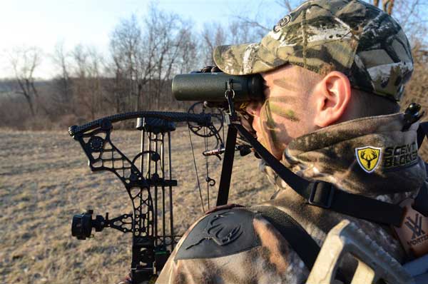 A Hunter Using Binoculars