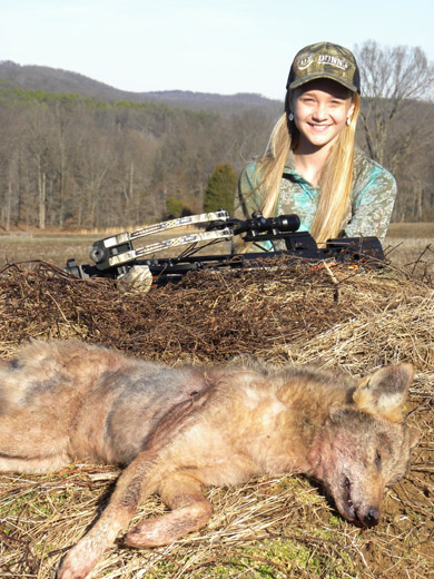 Girl with hunted Coyote