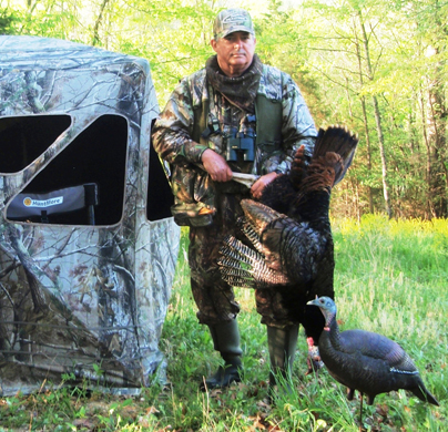 Hunter with Dead Turkey