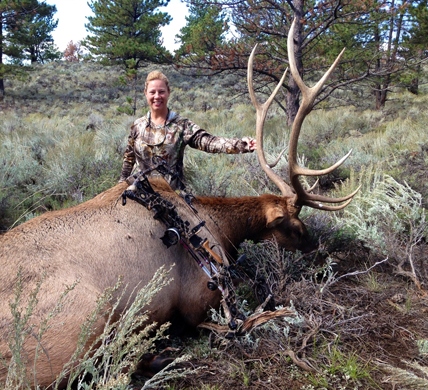 Hunter with arrowed Elk