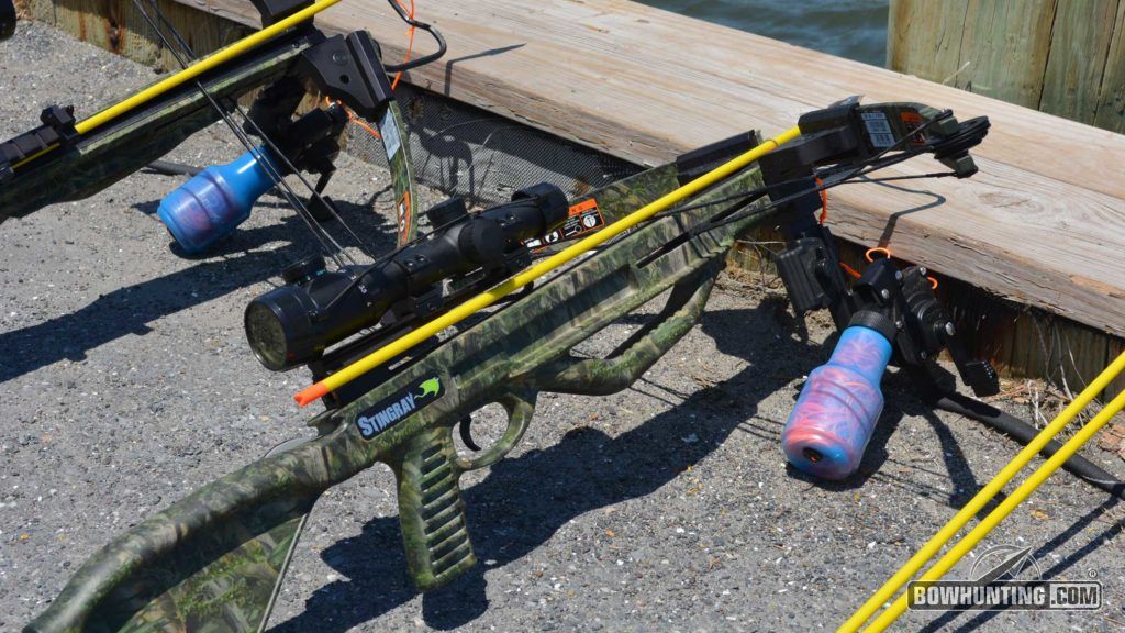 A crossbow rigged with an AMS Bowfishing Retrieval Reel and arrows tipped with grapple-like broadheads are designed specifically for bowfishing.