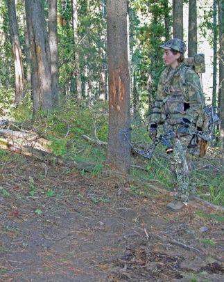 Leah Durkin checks out a bull elk’s rubs and scrape while bowhunting in Idaho in September 2008.