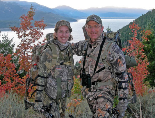 Leah and Patrick Durkin stand atop an Idaho mountain while bowhunting elk in September 2008.