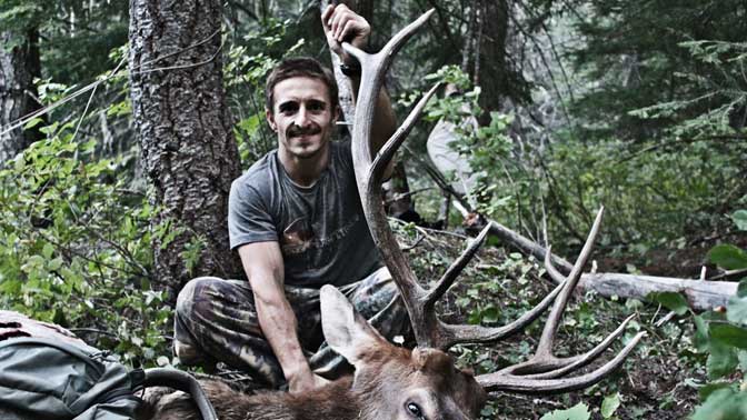 The author with the rewards of an early season elk hunt. 