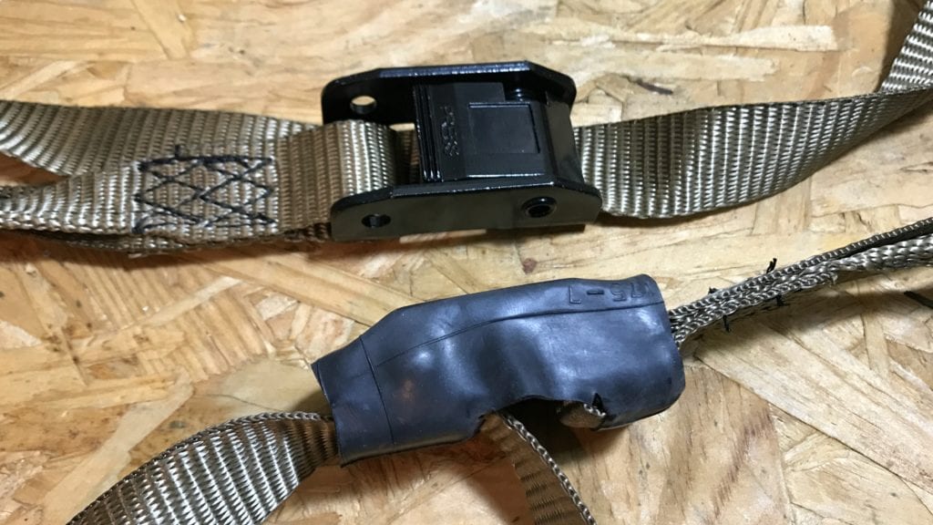 Bicycle tire innertube on Lone Wolf strap buckle.