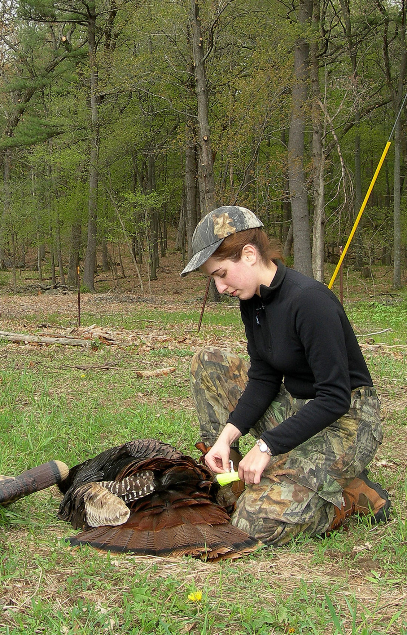 hunter with dead turkey