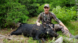 tyler with dead hog