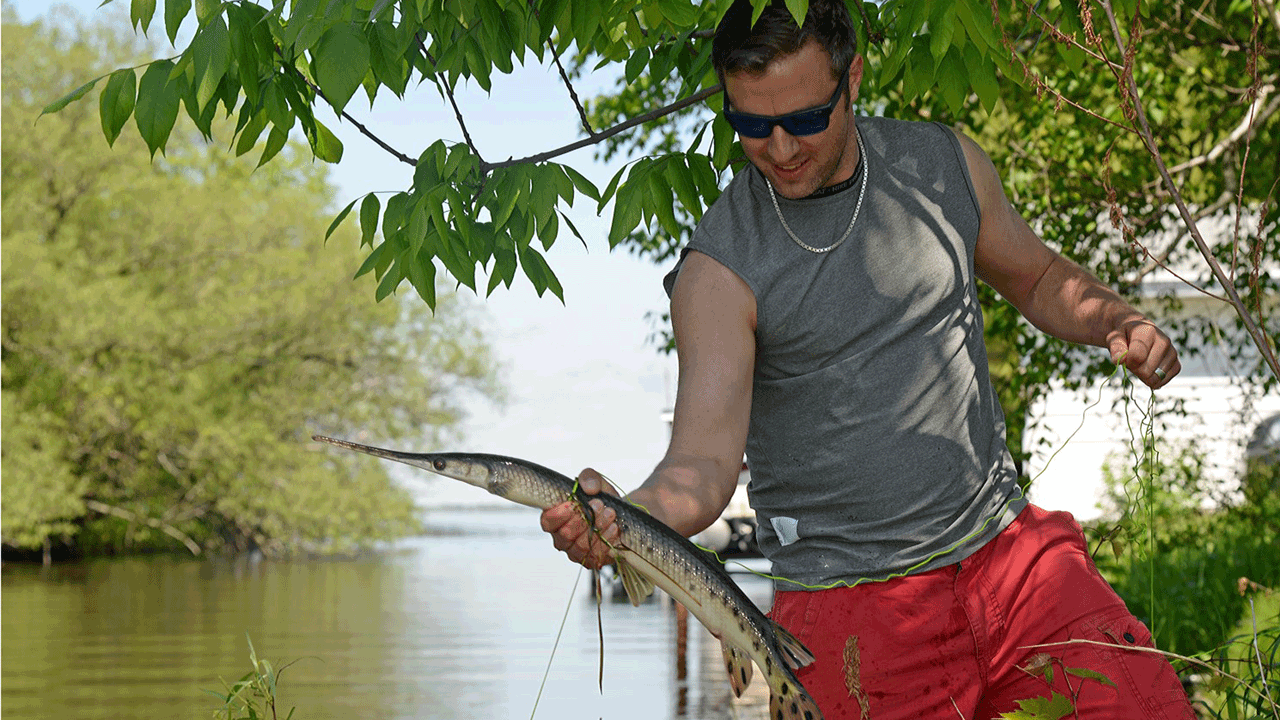 bowfisherman with gar