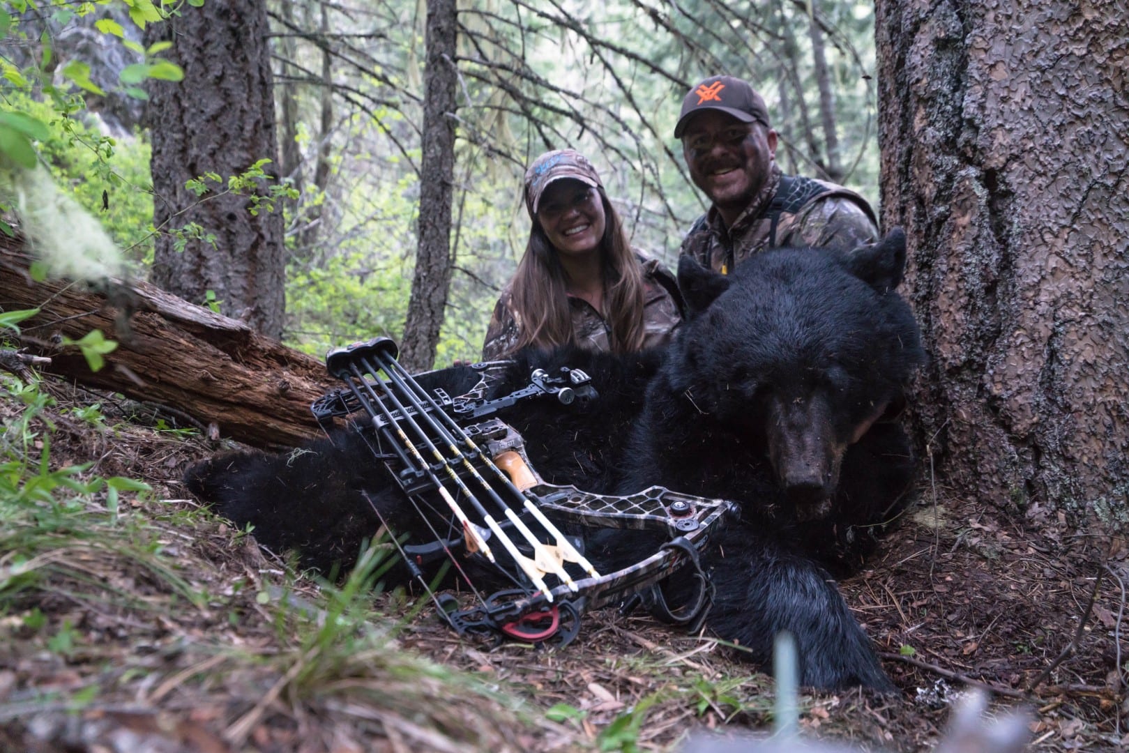 husband and wife with bear