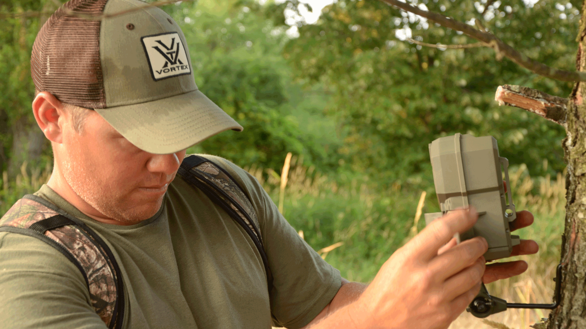 checking-trail-camera