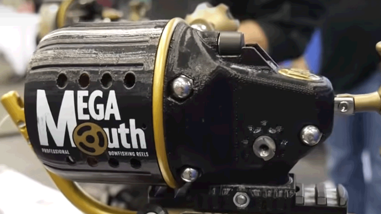 How to convert your MegaMouth reel from right to left handed., This video  will show you how to convert your MegaMouth bowfishing reel from right to  left handed.