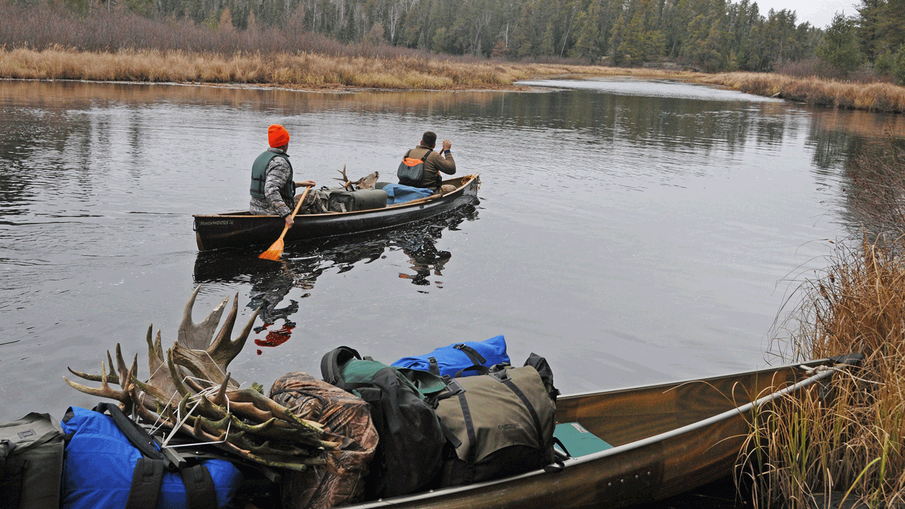 secretary-zinke-hunters-in-canoe