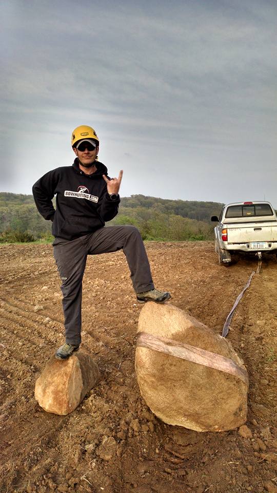 Todd posing on a log.