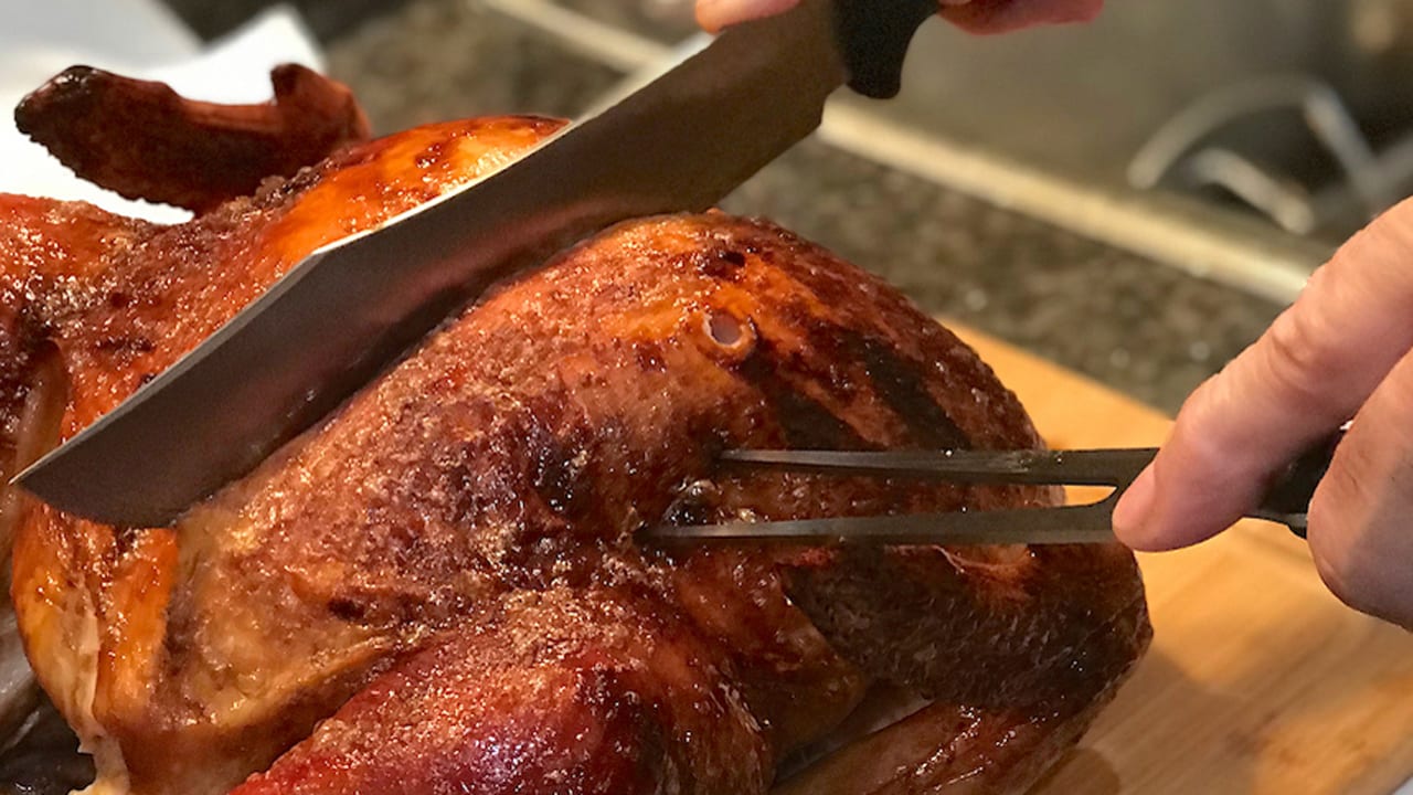 turkey carving - bourbon glazed holiday turkey