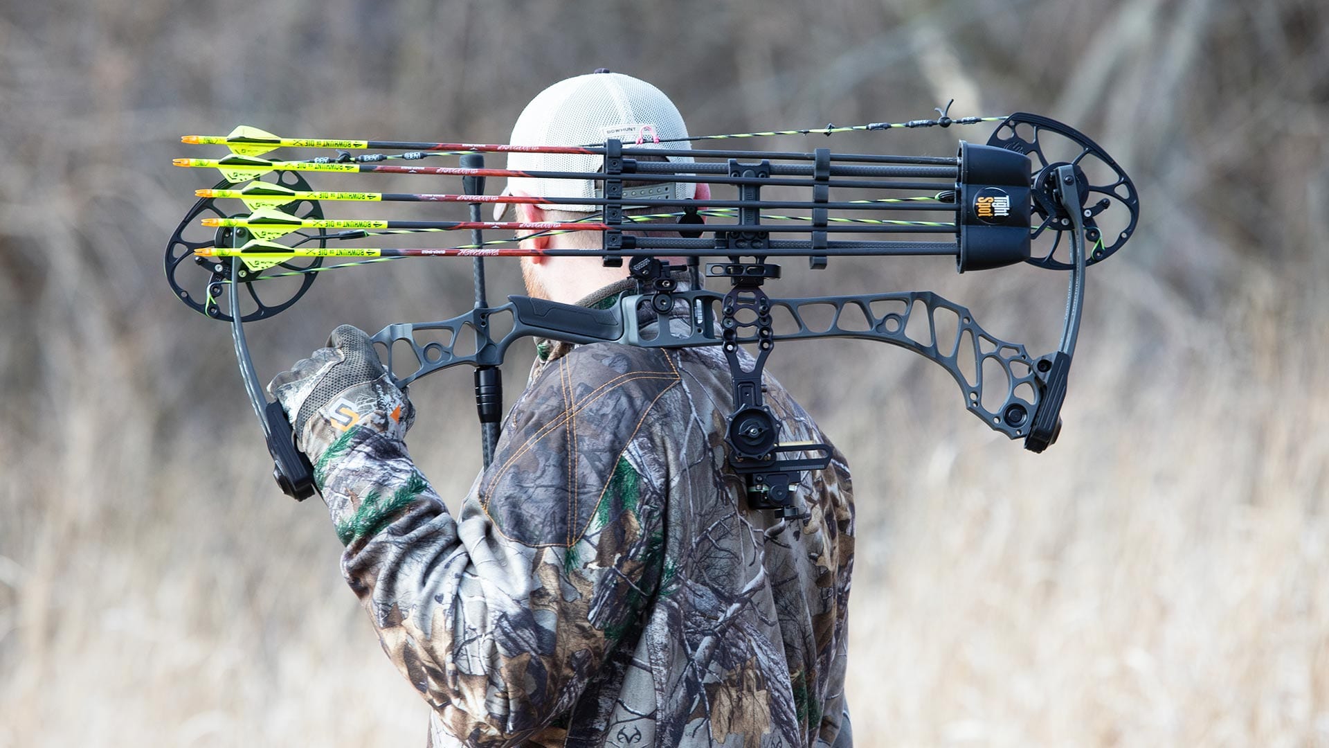 Bowhunter Carrying Bow