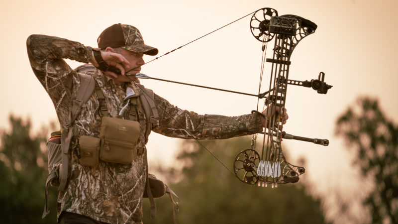 bowhunter at full draw with a mathews bow