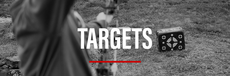 Archer practicing with block target