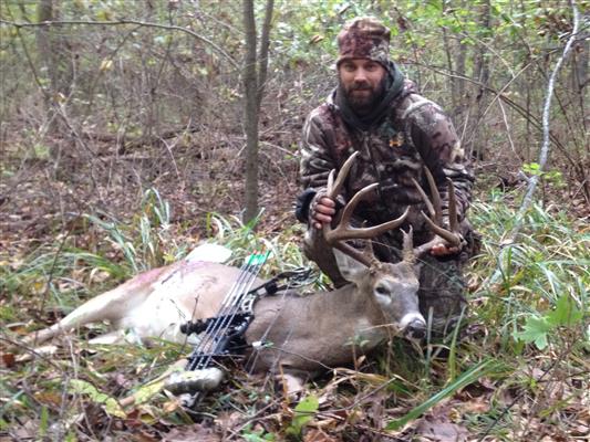 Chris Hall with his first buck with bow