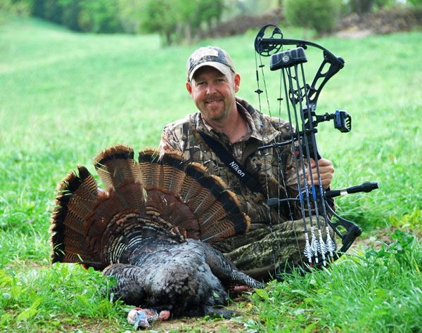 Tim Herald with a turkey he harvested using Carbon Express Precision Nocks