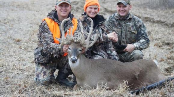 three hunters around freak doe buck